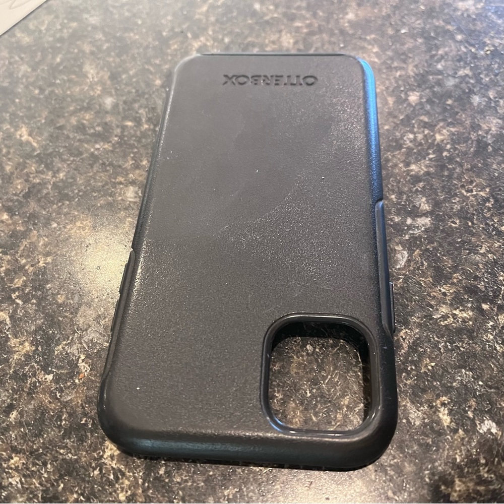Used iPhone 11 Otterbox soft plastic case - has sticker residue on back